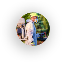 pest control service jamica man walking and spraying for moasquito perst control service